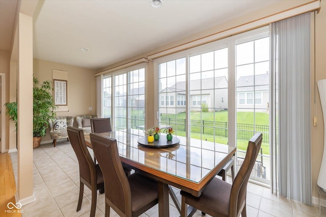 14018 Powder Dr, Carmel, IN 46033 - dining room with light tile patterned flooring, baseboards, and recessed lighting