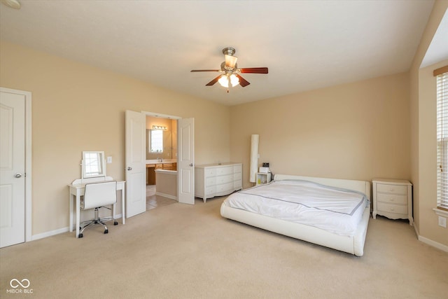 14018 Powder Dr, Carmel, IN 46033 - bedroom with light carpet, baseboards, a ceiling fan, and ensuite bath