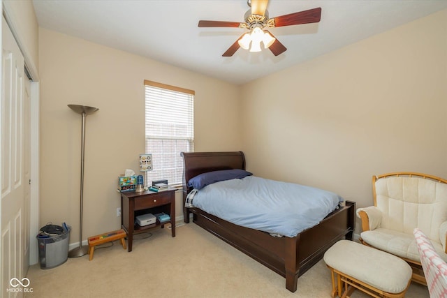 14018 Powder Dr, Carmel, IN 46033 - bedroom with light colored carpet and a ceiling fan