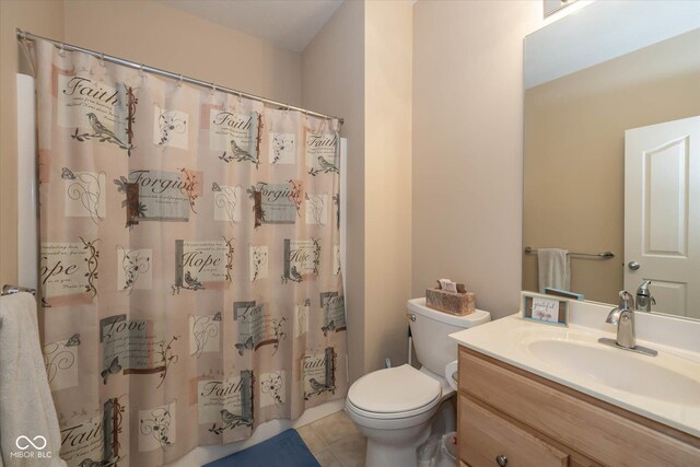 14018 Powder Dr, Carmel, IN 46033 - full bathroom with toilet, vanity, tile patterned floors, and a shower with curtain