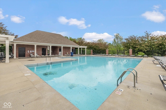 14018 Powder Dr, Carmel, IN 46033 - community pool with a patio area and fence