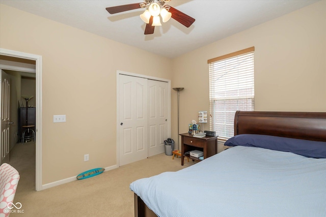 14018 Powder Dr, Carmel, IN 46033 - bedroom with carpet floors, a closet, baseboards, and ceiling fan
