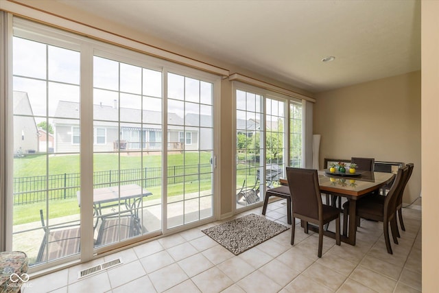 14018 Powder Dr, Carmel, IN 46033 - dining room featuring light tile patterned flooring