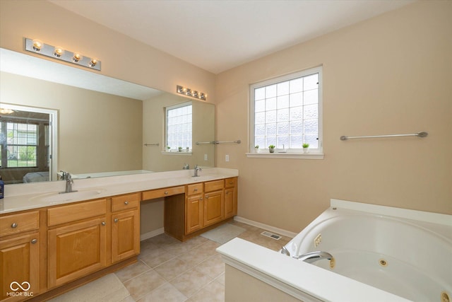14018 Powder Dr, Carmel, IN 46033 - bathroom featuring tile patterned floors, double vanity, a tub with jets, and baseboards