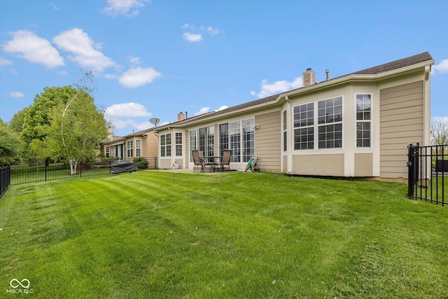 14018 Powder Dr, Carmel, IN 46033 - back of property with a chimney and a patio area
