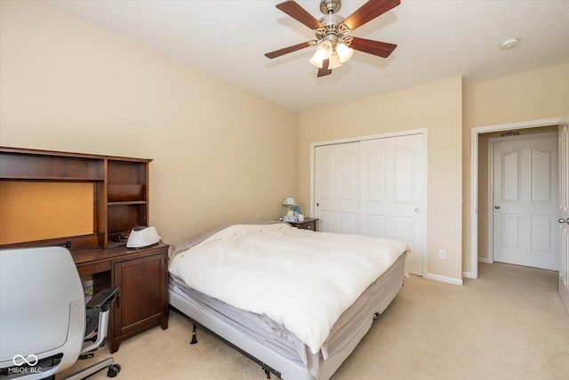 14018 Powder Dr, Carmel, IN 46033 - bedroom featuring light carpet, a closet, ceiling fan, an office area, and baseboards