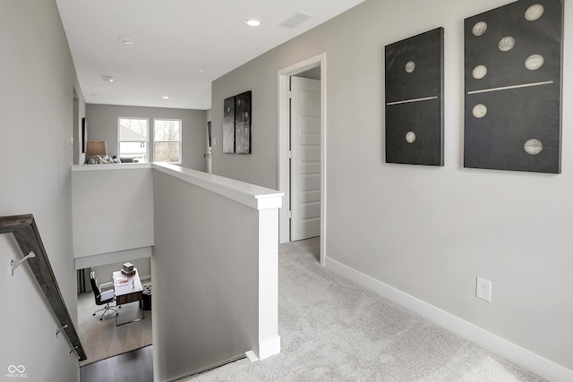 1075 Marston Ln, Avon, IN 46123 - hall featuring baseboards, carpet, an upstairs landing, and a desk