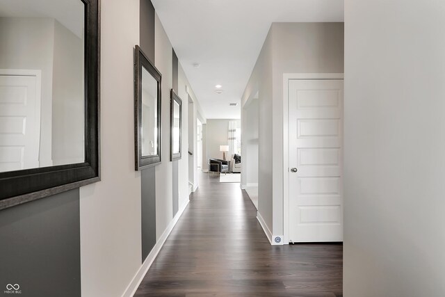 1075 Marston Ln, Avon, IN 46123 - hall with dark wood-type flooring and baseboards