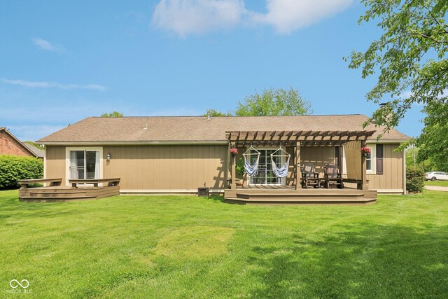 4732 Ferguson Rd, Indianapolis, IN 46239 - rear view of house featuring a pergola, a deck, and a lawn