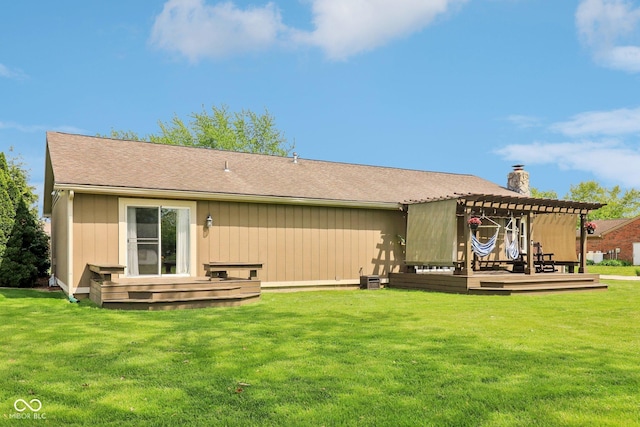 4732 Ferguson Rd, Indianapolis, IN 46239 - back of property with a pergola, a deck, a yard, and a chimney