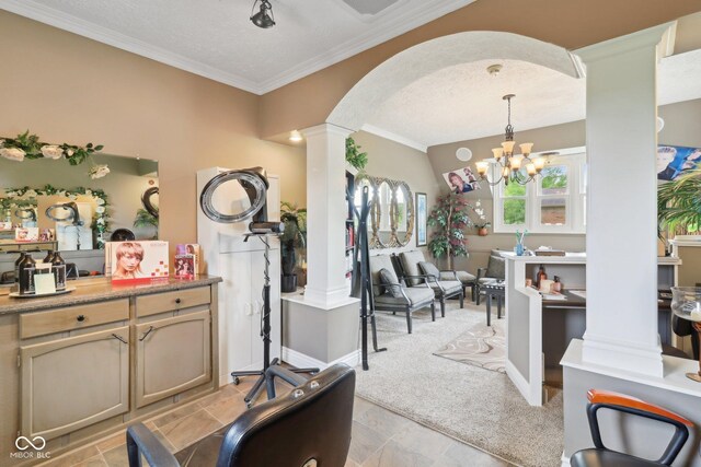 4732 Ferguson Rd, Indianapolis, IN 46239 - interior space featuring ornate columns, arched walkways, crown molding, light carpet, and a chandelier