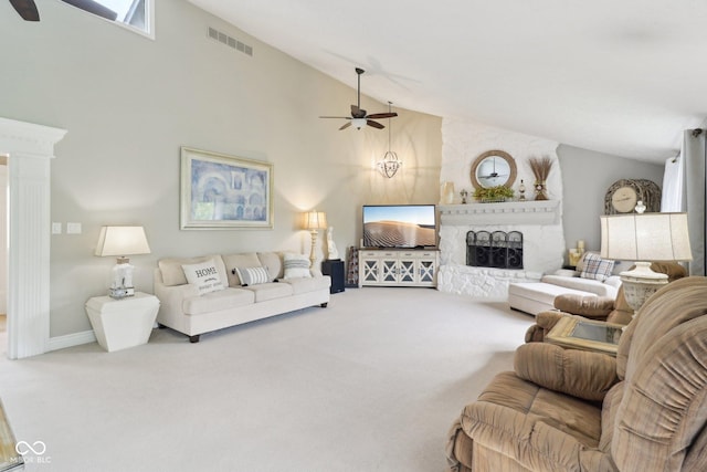 4732 Ferguson Rd, Indianapolis, IN 46239 - living room featuring a ceiling fan, carpet, high vaulted ceiling, decorative columns, and a large fireplace