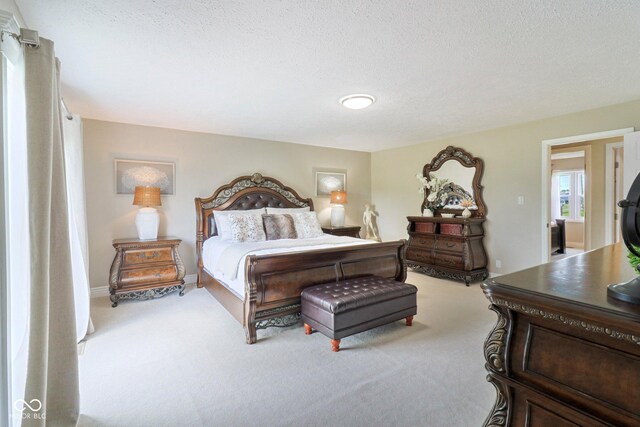 4732 Ferguson Rd, Indianapolis, IN 46239 - carpeted bedroom featuring a textured ceiling