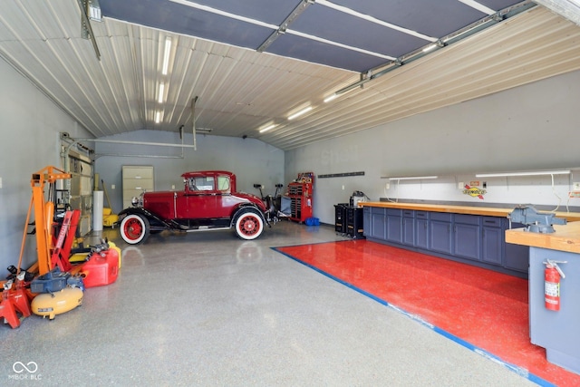 4732 Ferguson Rd, Indianapolis, IN 46239 - garage with a workshop area