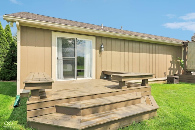 4732 Ferguson Rd, Indianapolis, IN 46239 - rear view of property featuring a wooden deck and a lawn