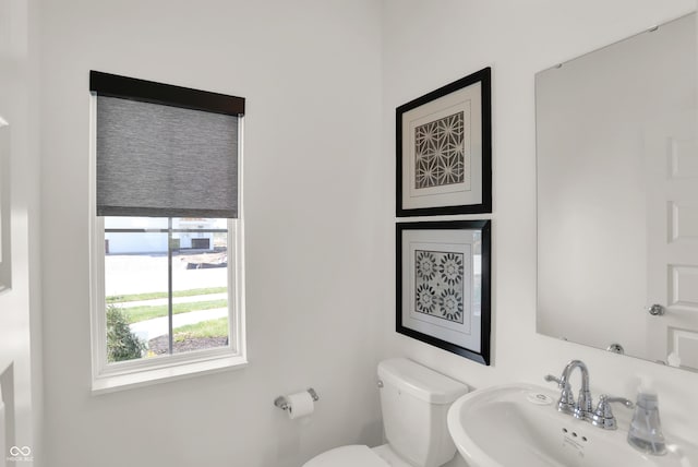 bathroom with a sink and toilet
