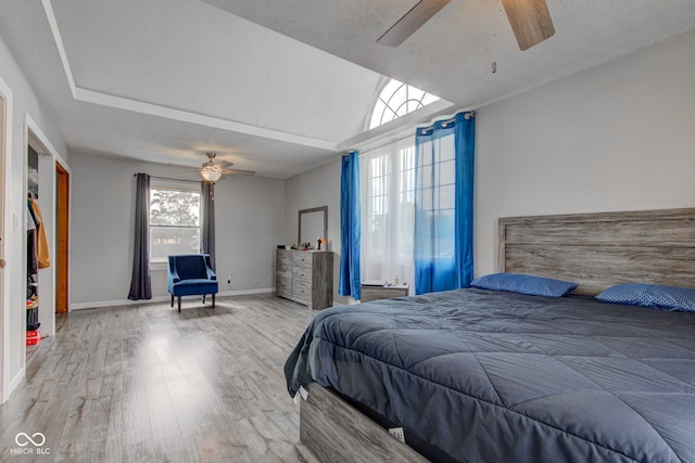 822 E King St, Kokomo, IN 46901 - bedroom with wood finished floors, baseboards, ceiling fan, and lofted ceiling