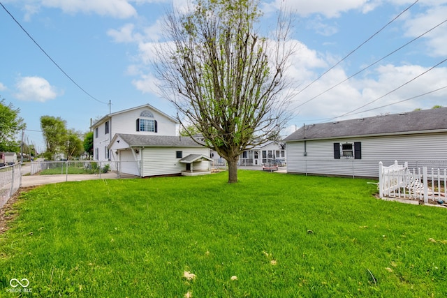 822 E King St, Kokomo, IN 46901 - view of yard with concrete driveway and an attached garage