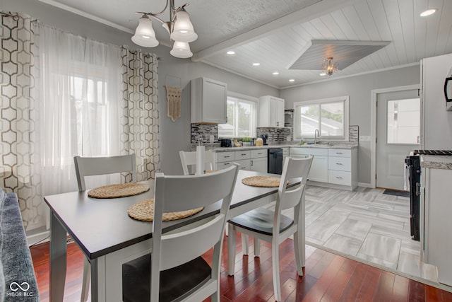 822 E King St, Kokomo, IN 46901 - dining room with a chandelier, ornamental molding, recessed lighting, wooden ceiling, and light wood finished floors