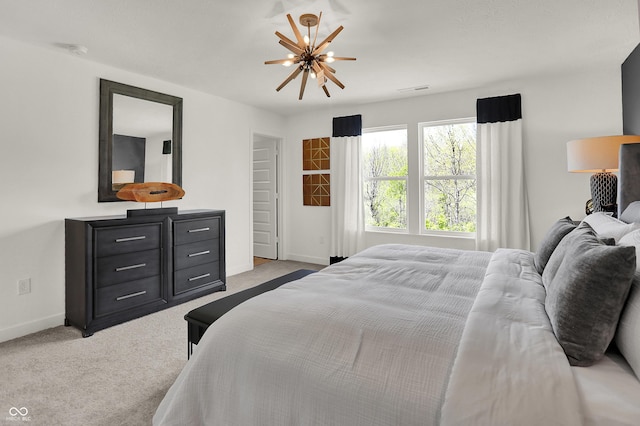 carpeted bedroom featuring baseboards and ceiling fan
