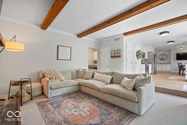 10444 Collingswood Ln, Fishers, IN 46037 - living area with beamed ceiling and carpet flooring