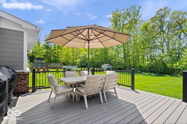 10444 Collingswood Ln, Fishers, IN 46037 - wooden terrace with outdoor dining space, a yard, and grilling area
