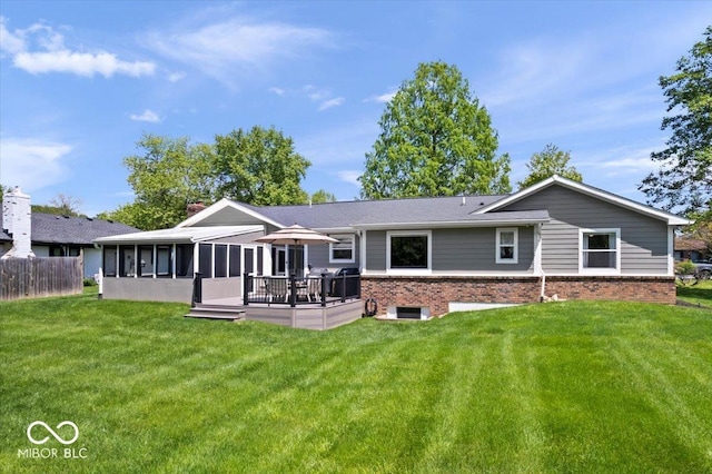 10444 Collingswood Ln, Fishers, IN 46037 - back of house featuring a sunroom, a lawn, and brick siding