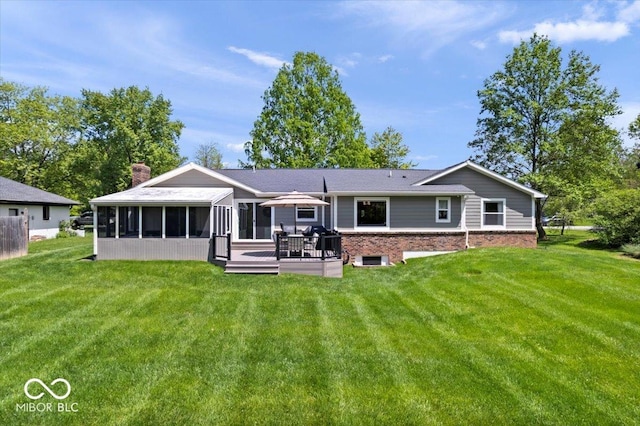 10444 Collingswood Ln, Fishers, IN 46037 - rear view of house featuring a sunroom, a yard, a deck, and a chimney