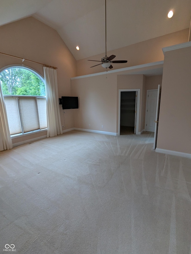 9640 Bramblewood Way, Carmel, IN 46032 - unfurnished living room featuring a ceiling fan, light carpet, high vaulted ceiling, baseboards, and recessed lighting