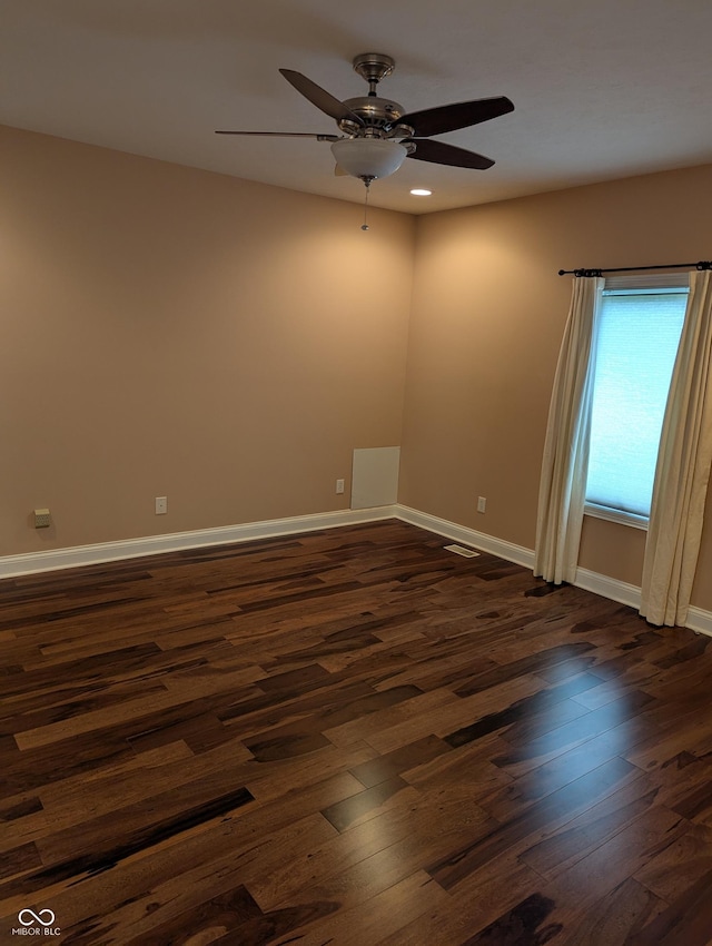 9640 Bramblewood Way, Carmel, IN 46032 - spare room featuring dark wood finished floors, a ceiling fan, baseboards, and recessed lighting