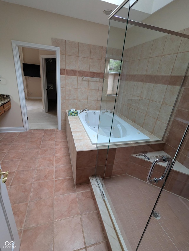 9640 Bramblewood Way, Carmel, IN 46032 - bathroom with tile patterned floors, a whirlpool tub, and a shower stall