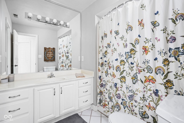 4956 Waterside Cir, Carmel, IN 46033 - bathroom featuring toilet, tile patterned flooring, vanity, and curtained shower