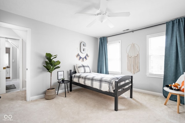 4956 Waterside Cir, Carmel, IN 46033 - carpeted bedroom with baseboards and ceiling fan