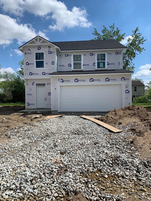 1041 Fuller Ln, Shelbyville, IN 46176 - view of front of home featuring an attached garage and gravel driveway