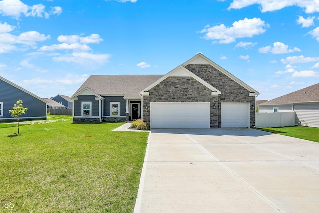 49 Manchester Dr, Trafalgar, IN 46181 - view of front of property featuring stone siding, an attached garage, and driveway