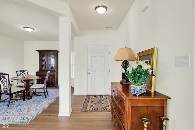 49 Manchester Dr, Trafalgar, IN 46181 - foyer entrance featuring wood finished floors
