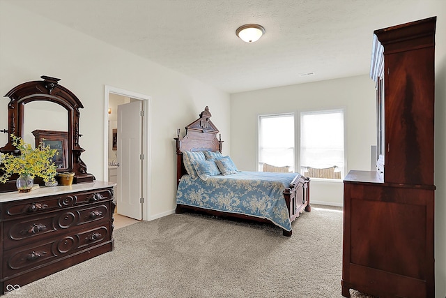 49 Manchester Dr, Trafalgar, IN 46181 - bedroom with light carpet and baseboards