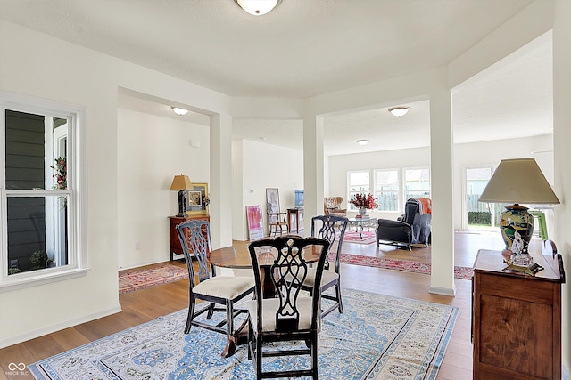 49 Manchester Dr, Trafalgar, IN 46181 - dining room with wood finished floors and baseboards