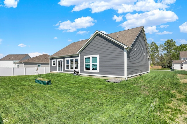49 Manchester Dr, Trafalgar, IN 46181 - rear view of house with a shingled roof