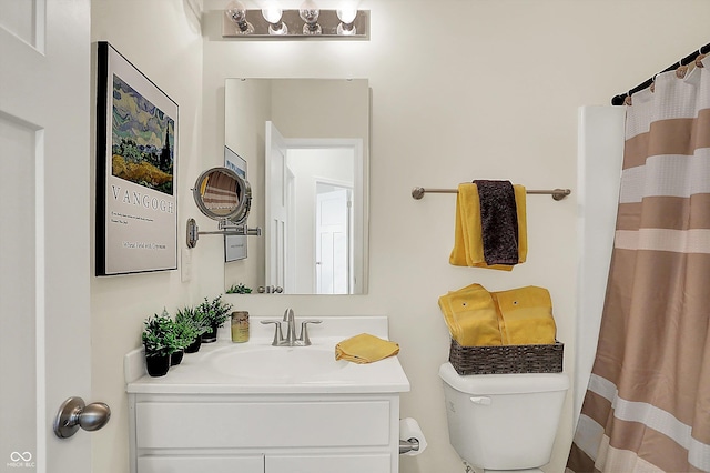 49 Manchester Dr, Trafalgar, IN 46181 - full bathroom featuring vanity, toilet, and curtained shower