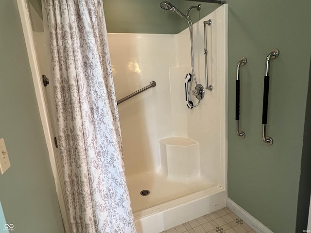 1345 E County Road 300 S, New Castle, IN 47362 - full bath featuring a stall shower, tile patterned flooring, and baseboards