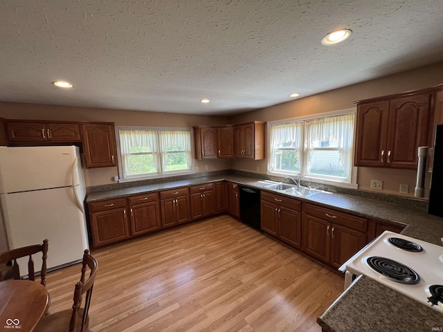 1345 E County Road 300 S, New Castle, IN 47362 - kitchen featuring white appliances, a sink, dark countertops, a textured ceiling, and recessed lighting