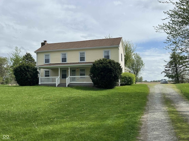 1345 E County Road 300 S, New Castle, IN 47362 - view of front facade featuring covered porch, a chimney, a front yard, and driveway