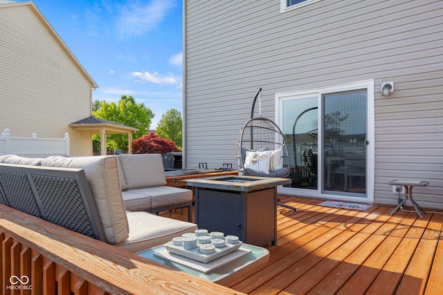 wooden deck with outdoor lounge area