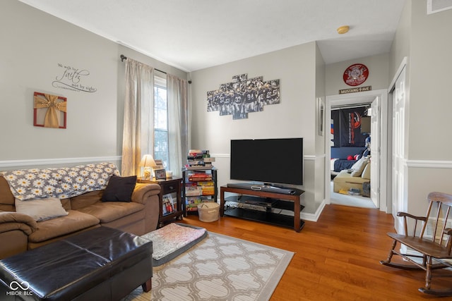 living area with wood finished floors