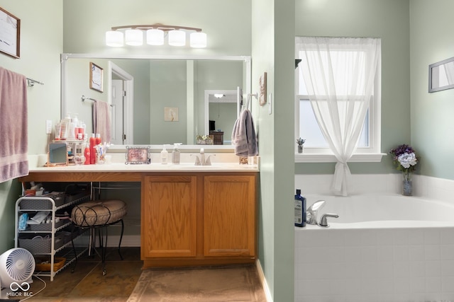 full bathroom with vanity and a garden tub