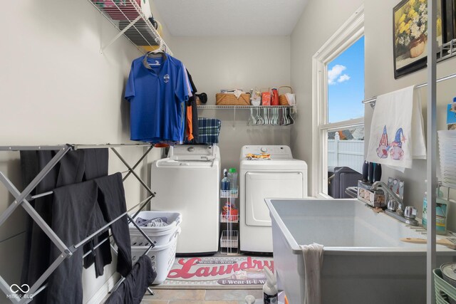 laundry room with separate washer and dryer
