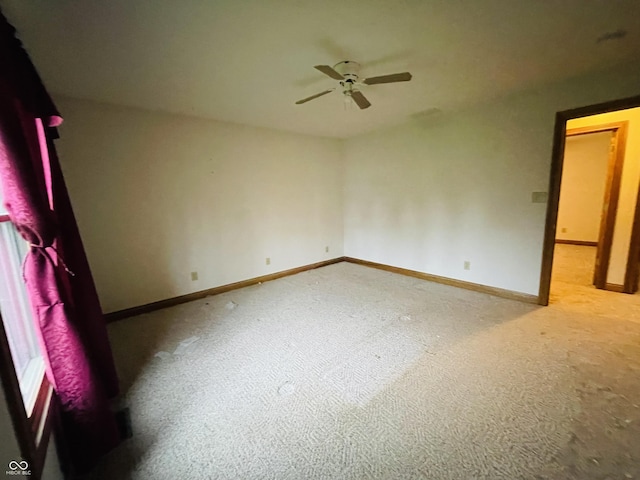 4706 W Old Trail Rd, Knightstown, IN 46148 - unfurnished room featuring ceiling fan, baseboards, and carpet