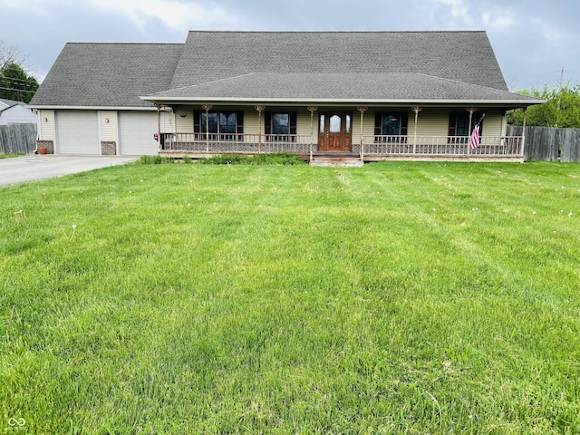 4706 W Old Trail Rd, Knightstown, IN 46148 - farmhouse featuring covered porch, a garage, a shingled roof, and concrete driveway