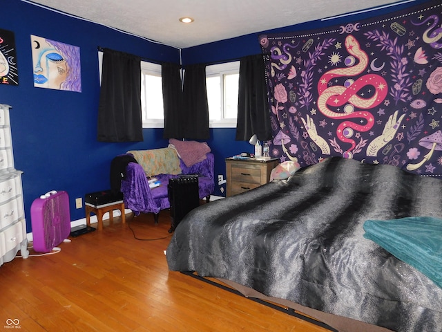 2867 S Oakland Dr, Shelbyville, IN 46176 - bedroom featuring wood finished floors, baseboards, and recessed lighting
